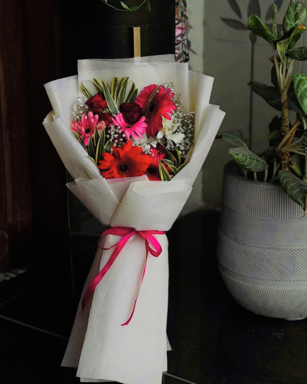 Sunflower bouquet with white wrapping by Lavanta Florals