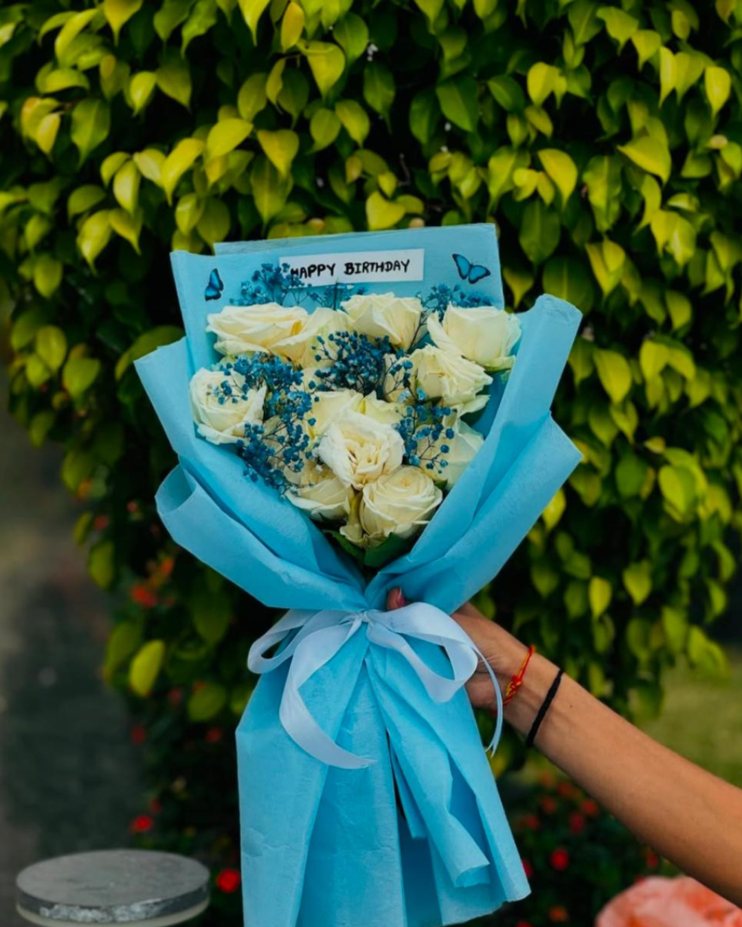 Elegant white rose bouquet by Lavanta Florals